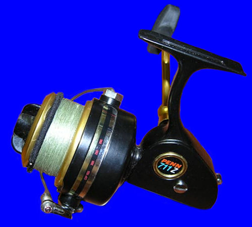 Vintage Penn 712Z Black and Gold Power Drag Spinning Reel Made in